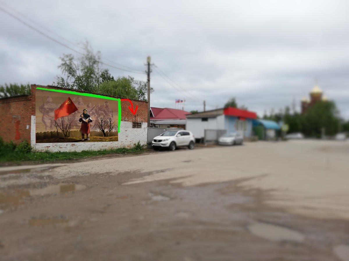 В Марьянской появится баннер с изображением украинской бабушки с красным флагом